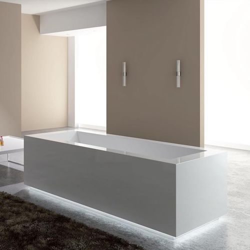 Free-standing bathtub - QUADRISSIMA - RELAX DESIGN - Corian® / hydromassage / chromotherapy