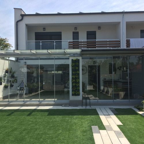 Sliding and stacking patio door - movable glass - BKS balcony glazing systems - bi-fold / aluminum / 3 leaves