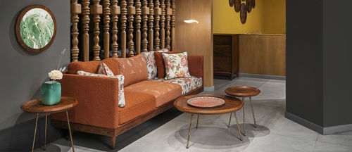 Modern sofa - PRIAMKA - ALANKARAM - fabric / with armrests / cushion
