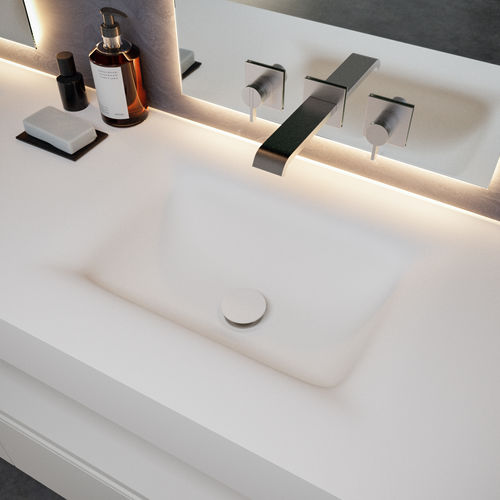 Wall-mounted washbasin - CORVUS SLIM - Riluxa - Corian® / with counter / custom