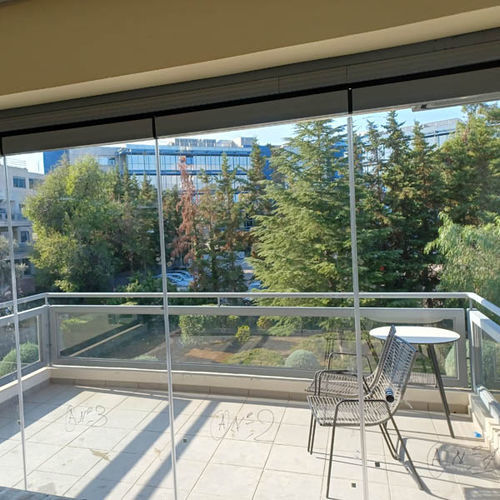 Folding partition - IN MAROUSSI - Atrio Glass Doors - with glass panel / crystal / aluminum