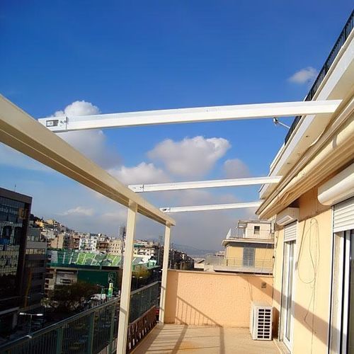 Wall-mounted pergola - ALEXANDRAS - Atrio Glass Doors - metal / fabric / retractable