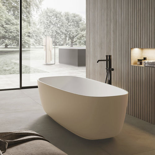 Oval bathtub - RIVER - Disenia - free-standing / for homes / composite