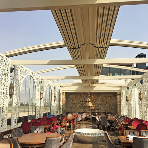 Wall-mounted pergola - ECO SHELL - BYART GROUP - aluminum / with sliding canopy / retractable