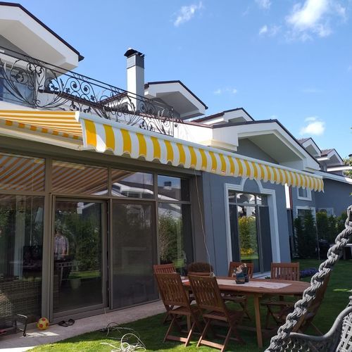 Folding-arm awning - WILLOW - BYART GROUP - motorized / commercial / patio