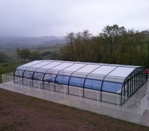 High swimming pool enclosure - Carla Eco - planetabri - fixed / aluminum / polycarbonate