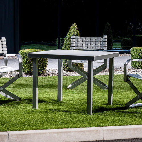 Contemporary table - ESSTISCH - BOXMARK Leather d.o.o. - aluminum / leather / aluminum base
