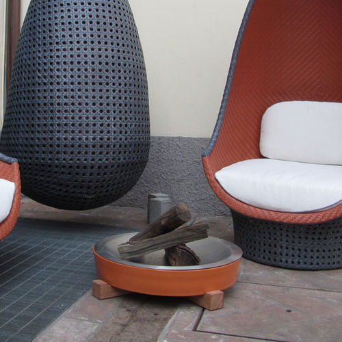 Wood-burning fire pit - DEDON - Monolite Ipergres - ceramic
