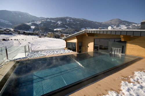Infinity swimming pool - HOTEL ALPINA - BERNDORF METALL- UND BÄDERBAU GMBH - outdoor / for hotel / public