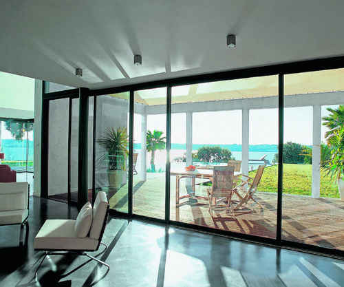 Sliding patio door - GREENSLIDE - Aliplast - aluminum / double-glazed / acoustic