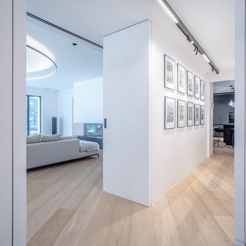 Pivoting door - ELEZIO - interior / solid wood / aluminum