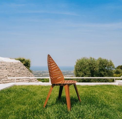 Original design chair - LILA - Trackdesign - garden / COR-TEN® steel / metal base