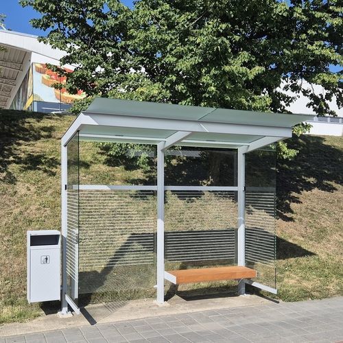 Painted steel bus shelter - NOVIO - STREETPARK s.r.o. - pine / frosted glass / tempered glass
