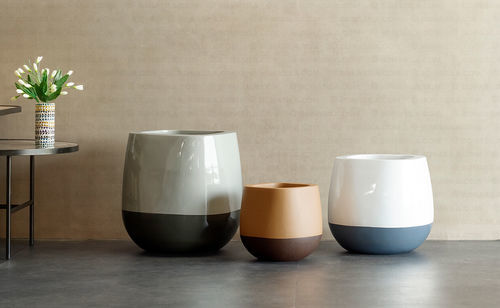 Fiberglass plant pot - Torta - Bonasila - glass-reinforced plastic / table / circular