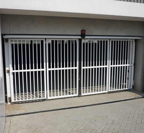 Folding gate - SGATE TOP GUIDED - HERAS - galvanised steel / with bars / glass panel