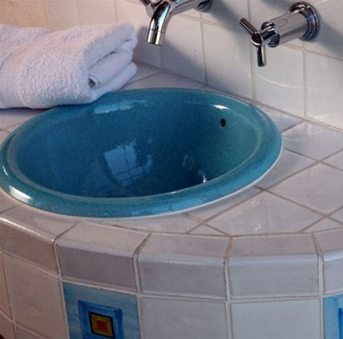Built-in washbasin - ONDINE - TERRES CUITES DE RAUJOLLES - ceramic / high-gloss / round