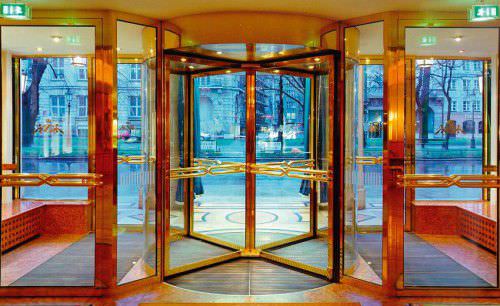 Entry door - Tambest Glass Solutions - wooden / revolving / glazed