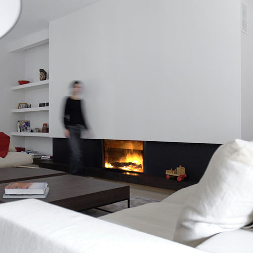 Wood-burning fireplace insert - 21-95 - Stûv - steel / natural convection / contemporary