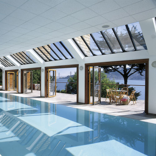 Sliding patio door - SL 97 - SOLARLUX - bi-fold / wooden / aluminum