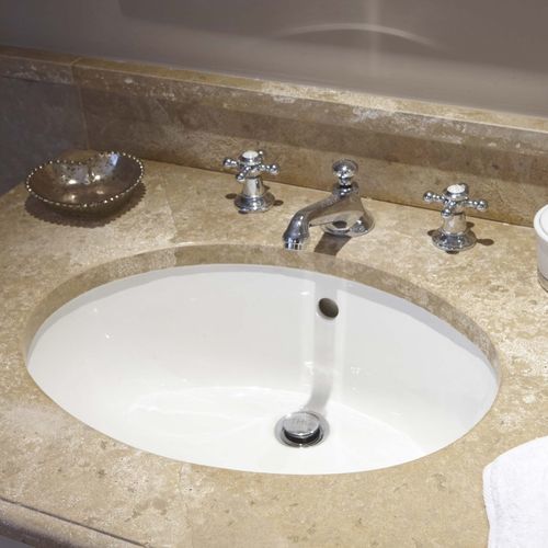 Undercounter washbasin - AUBEROCHE OCRE - OCCITANIE PIERRES - natural stone / with counter / oval