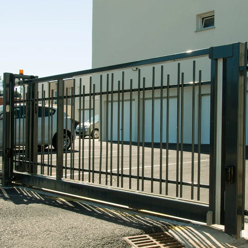 Roller gate - PRIMADESIGN™ - NORMACLO - steel / with bars / motorized