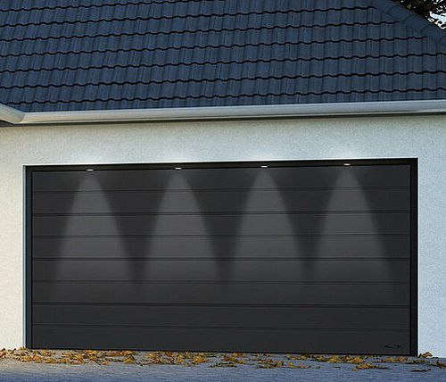 Sectional garage door - PREMIUM PLUS - Novoferm - steel / automatic / insulated