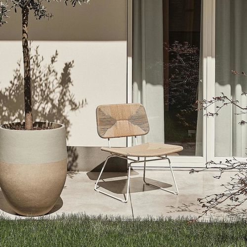 Contemporary armchair - ECHOES - FLEXFORM - polyurethane / stainless steel / with footrest