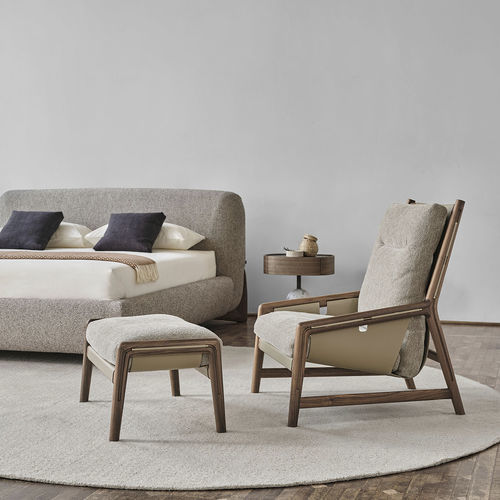 Contemporary relaxing armchair - BICE - Porada - leather / fabric / walnut