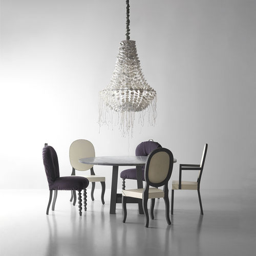 Contemporary chair - GAUCHA - LANDO - indoor / leather / solid wood base