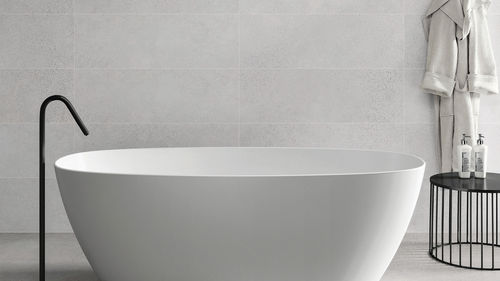 Oval bathtub - VICTORIA MATT - ZENON SMART SOLID SURFACE - freestanding / for homes / acrylic