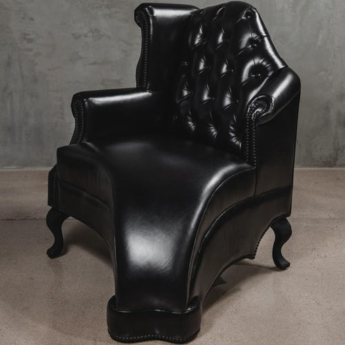 Classic armchair - THE MELTING - XAWD - leather / with footrest / wing