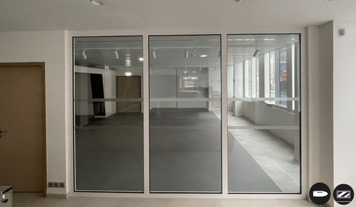 Fixed partition - SteelTeq FB4 - ERIBEL FRANCE - edge-to-edge / with glass panel / steel