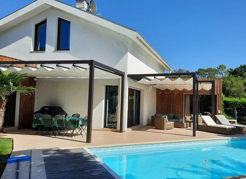 Wall-mounted pergola - USINE-ONLINE - extruded aluminum / PVC fabric sliding canopy / custom