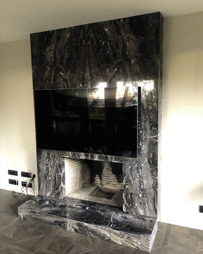 Contemporary fireplace surround - GRIGIO - PASIFIK GRANIT - marble / gray