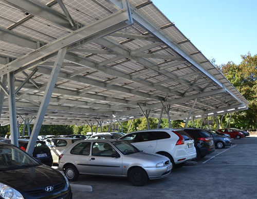 Parking lot carport - W- & N-frame - voestalpine Sadef nv - custom-made / with solar panel / steel