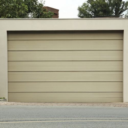 Tilting garage door - GATTO GROUP SRL - sectional / metal / manual