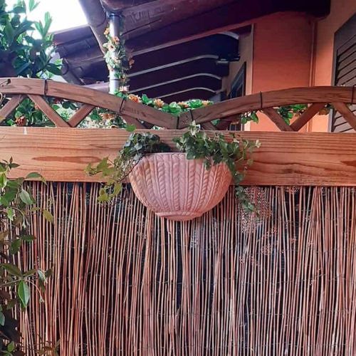 Terracotta planter - Tasca Intrecciata - cestenoli srl - curved / handmade / hanging