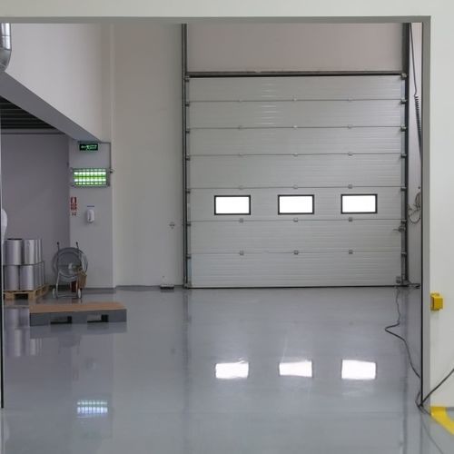 Sectional industrial door - ICAT®  - RSA Door Systems - galvanised steel / polyurethane / security
