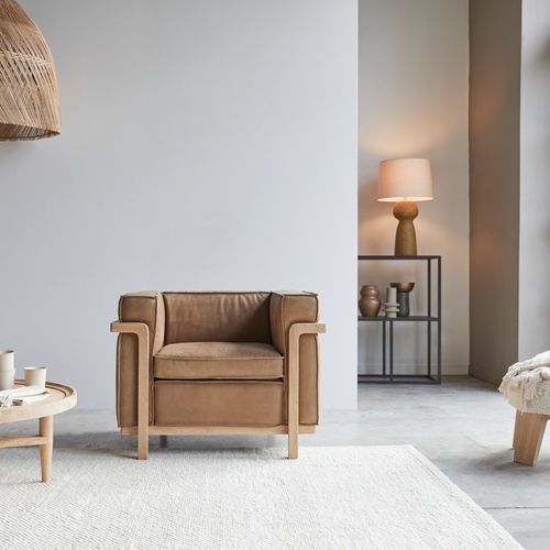 Contemporary armchair - COBBELWOOD - Tikamoon - leather / polyurethane foam / oak