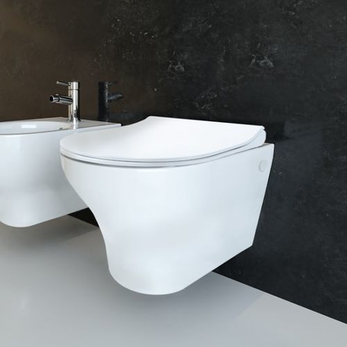 Wall-hung WC - SOLI - Ceramica Althea - ceramic / rimless / home