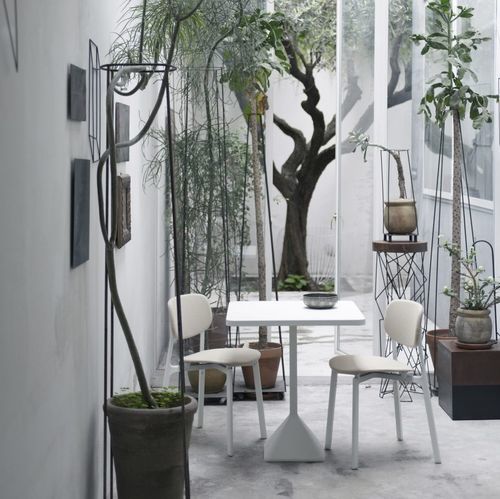 Contemporary bistro table - TNP  - Kristalia - cast iron / iron / cast iron base