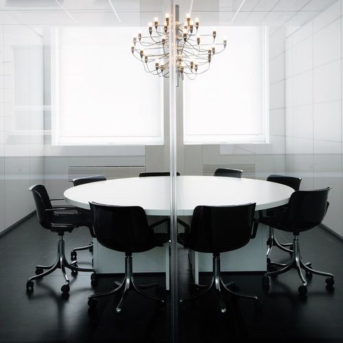 Contemporary boardroom table - GRAPHIS - TECNO - laminate / round / commercial