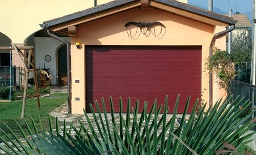 Sectional garage door - SIRIO - Breda Sistemi Industriali S.p.A. - Portoni Seziona - steel / automatic