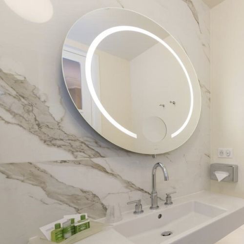 Round bathroom mirror - SADIR - MONTELEONE - wall-mounted / for hotel / for hotel room