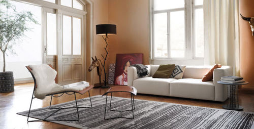 Contemporary fireside chair - CUOIO LOUNGE - Walter Knoll - leather / metal / with footrest
