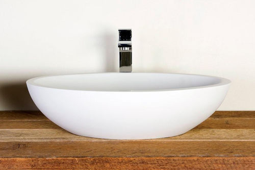 Countertop washbasin - MOLOKO - Dado Creations Pty (LTD) - stone / oval / contemporary