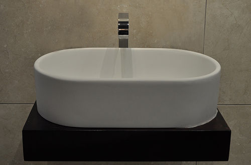 Countertop washbasin - OLIVIA - Dado Creations Pty (LTD) - stone / oval / contemporary