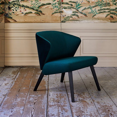 Contemporary fireside chair - BACK ME UP - MONTIS - leather / fabric / wooden