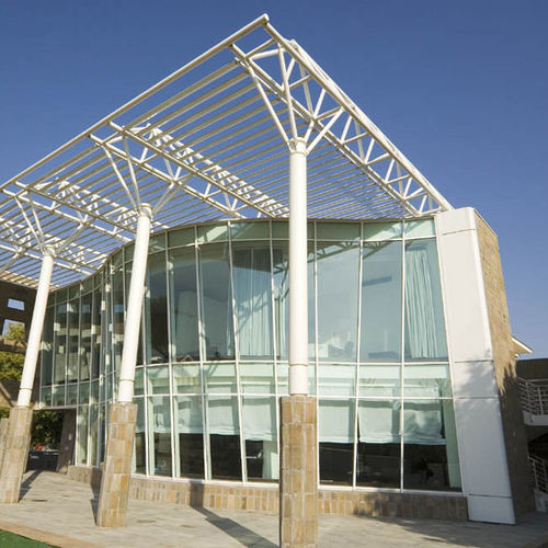 Stick system curtain wall - POLIEDRA-SKY 50 - METRA Building - aluminum and glass / acoustic / high-resistance