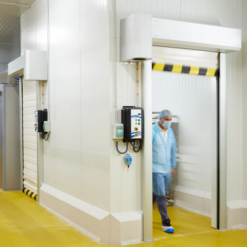 Roll-up industrial door - Manusa - anodized aluminum / polyester / automatic